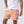 Killer Acid Acid Test swim trunks in a psychedelic pink and yellow liquid swirl print