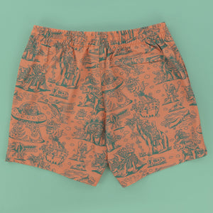 Killer Acid Cretaceous Cosmonauts swim trunks, salmon-orange with teal line-art dinosaurs, aliens and UFOs