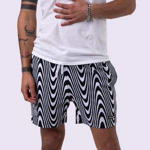 Killer Acid Wavy Vision swim trunks in a black-and-white op-art wavy stripe print