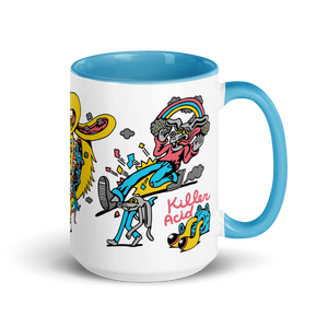 White 15oz ceramic mug with blue rim, handle, and interior, featuring colorful Killer Acid "Dog Daze" art.