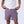 Killer Acid Wild Shroom swim trunks with an all-over teal and coral print of wild melting creatures and critter faces